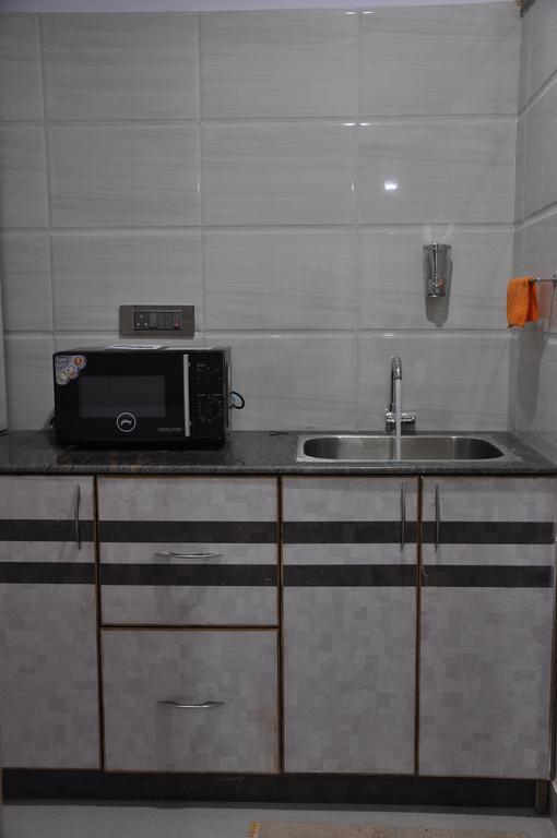 Hotel Av Comforts Bengaluru Szoba fotó